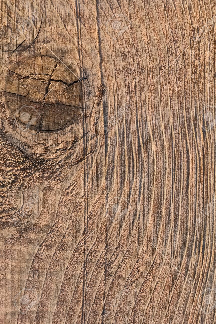 photograph of old roughly treated weathered cracked floorboard
