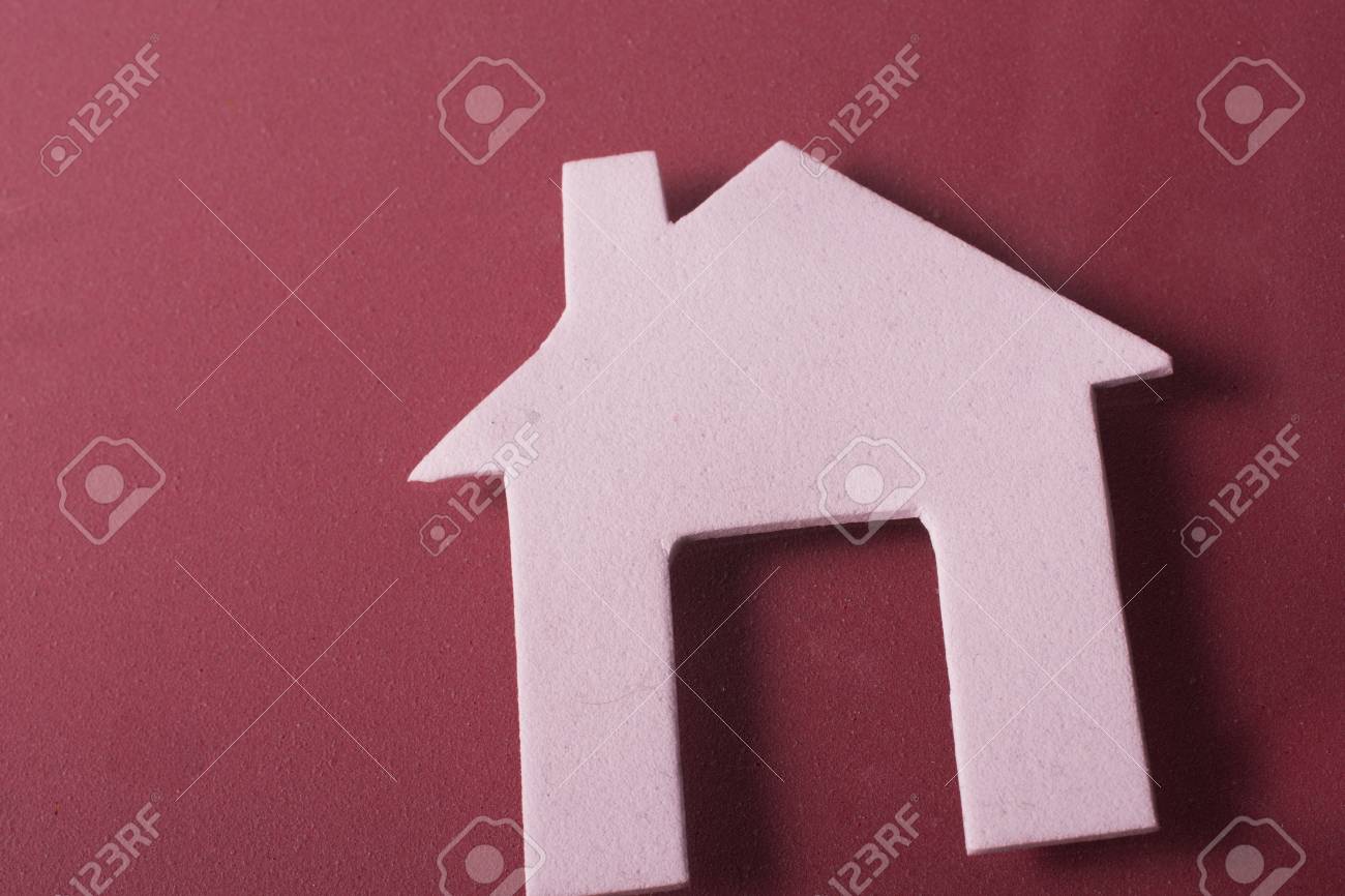 little house cut out of paper in hand in view stock photo picture house cut out