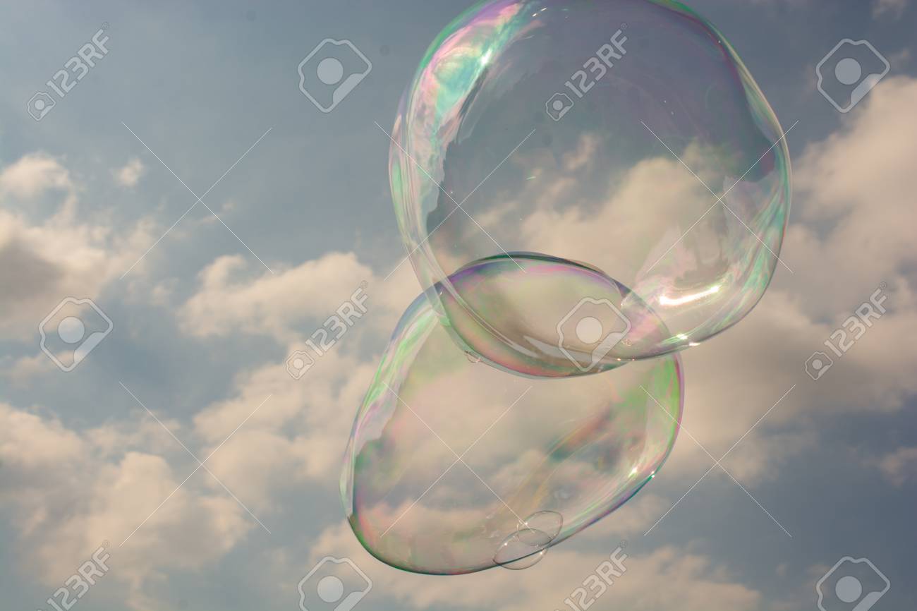 blown soap bubbles float in air in view bubbles float