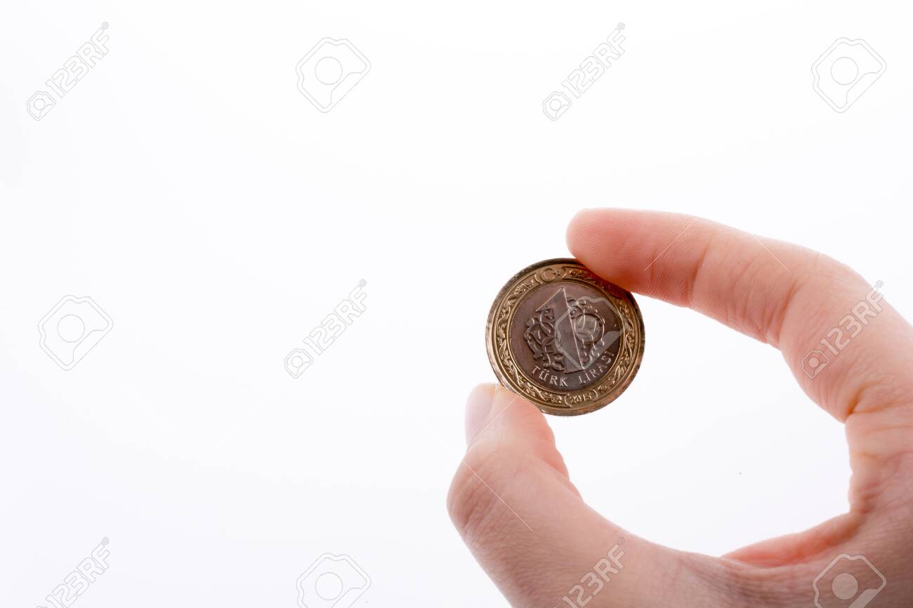 Moneda Turca Una Lira Turca En Mano Fotos, retratos, imágenes y fotografía  de archivo libres de derecho. Image 121707515