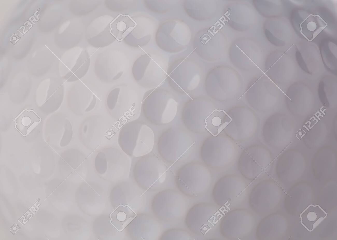 Golf ball close-up as a background. - 126197283 Golf ball close-up as a background. - 126197283