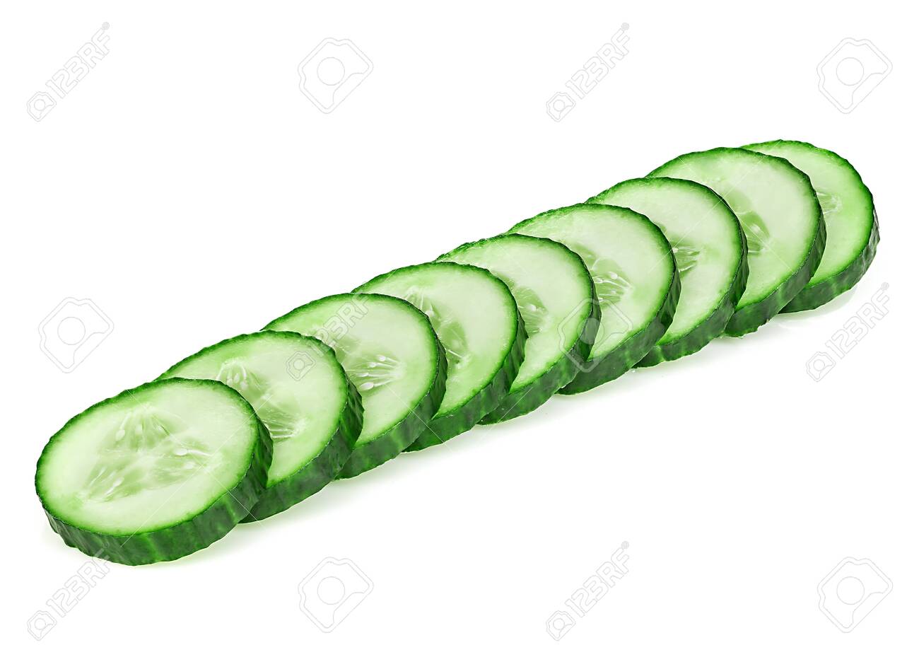 Fresh slice cucumber close-up on a white background. - 126197529 Fresh slice cucumber close-up on a white background. - 126197529