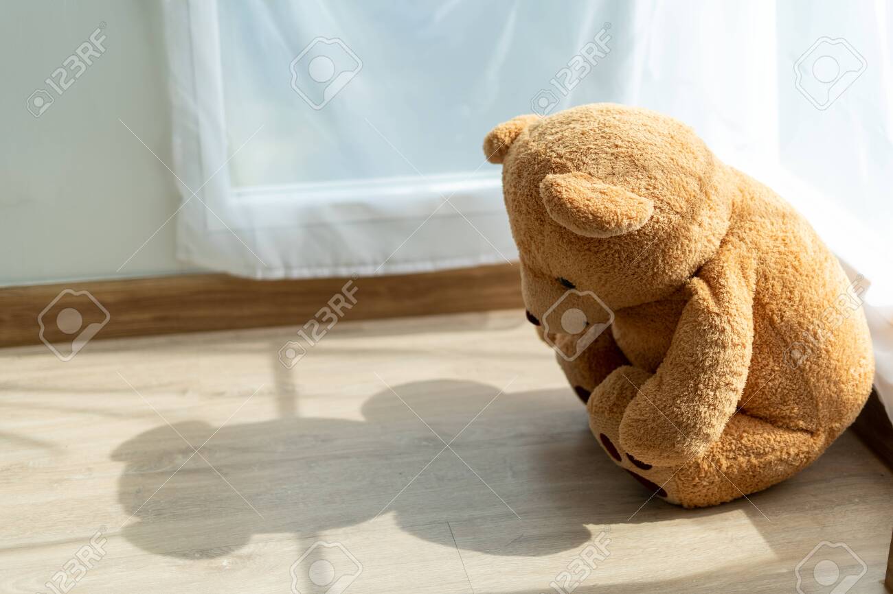 The Teddy Bear Looked Sad And Disappointed Sitting In The Corner ...