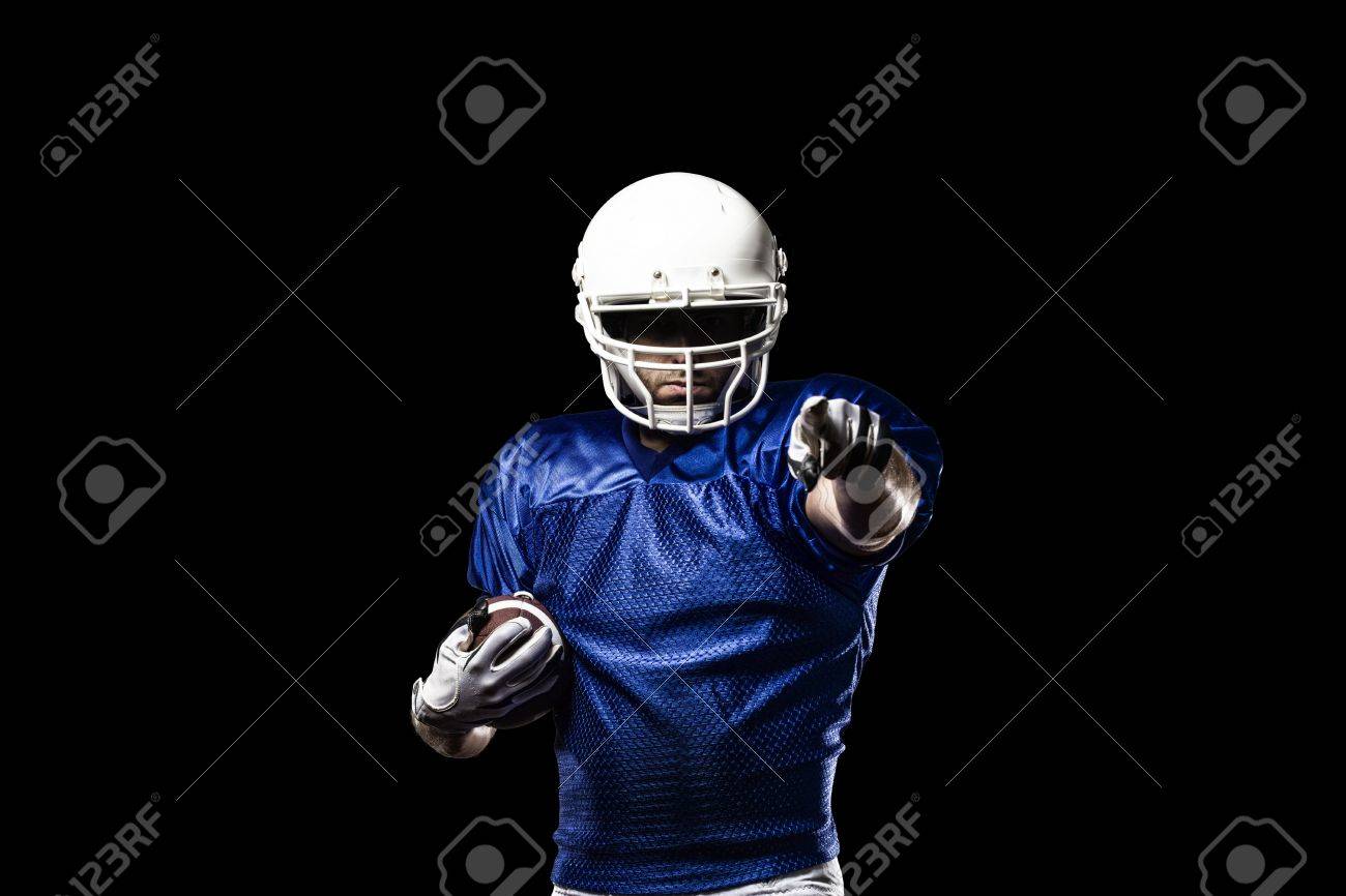 Football Player with a blue uniform celebrating on a Black background. - 21782193 Football Player with a blue uniform celebrating on a Black background. - 21782193