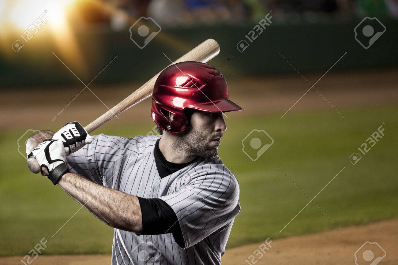 Baseball Player on a baseball Stadium. - 27529172 Baseball Player on a baseball Stadium. - 27529172