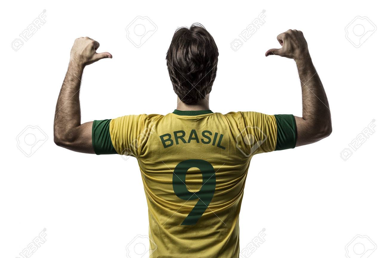 Brazilian soccer player, celebrating on a white background. - 27726732 Brazilian soccer player, celebrating on a white background. - 27726732