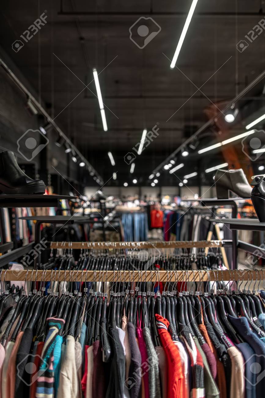 rack shoes outlet on Rack With Hanging Colorful Wear And Black Shelves With Shoes Stock Photo Picture And Royalty Free Image Image 120575596