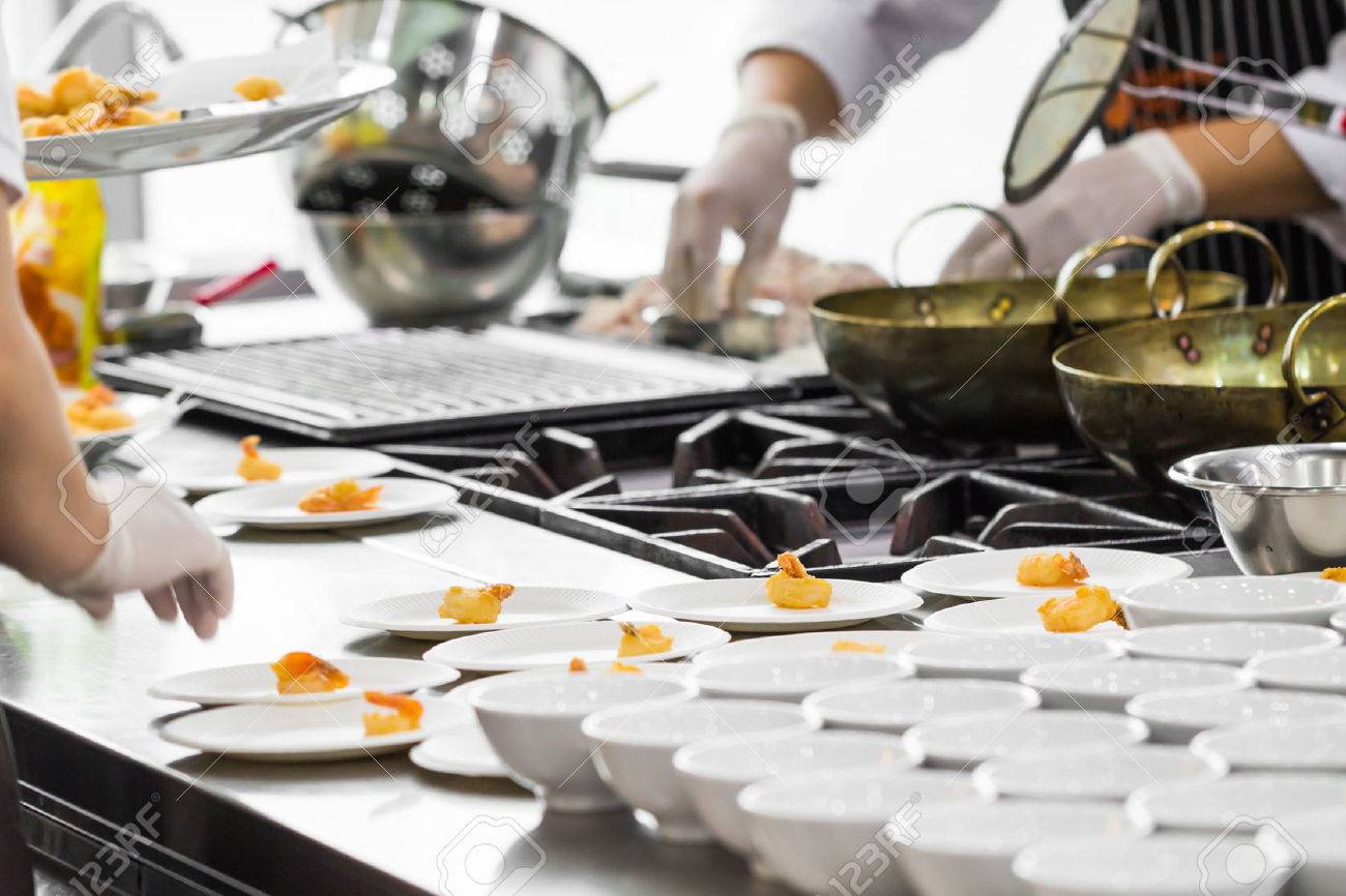 Busy Restaurant Kitchen busy cooking of chefs in restaurant kitchen stock photo, picture Busy Restaurant Kitchen busy cooking of chefs in restaurant kitchen stock photo, picture