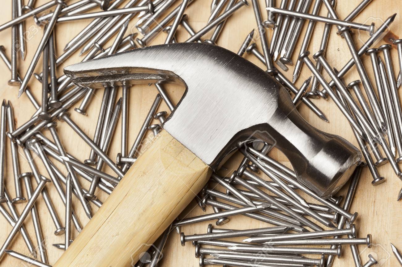 Hammer And Nails Used For Construction Stock Photo, Picture And Royalty  Free Image. Image 13861947.