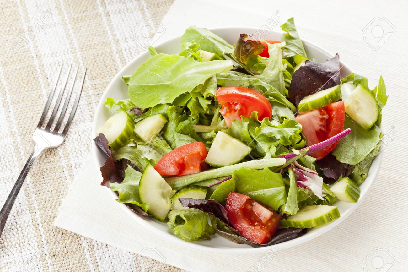 Fresh Green Organic Garden Salad On A Background Stock Photo, Picture and  Royalty Free Image. Image 16098268., image size:1300x866