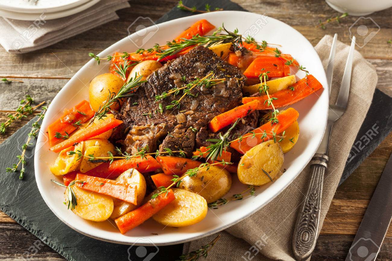 Homemade Slow Cooker Pot Roast with Carrots and Potatoes - 53875202 Homemade Slow Cooker Pot Roast with Carrots and Potatoes - 53875202