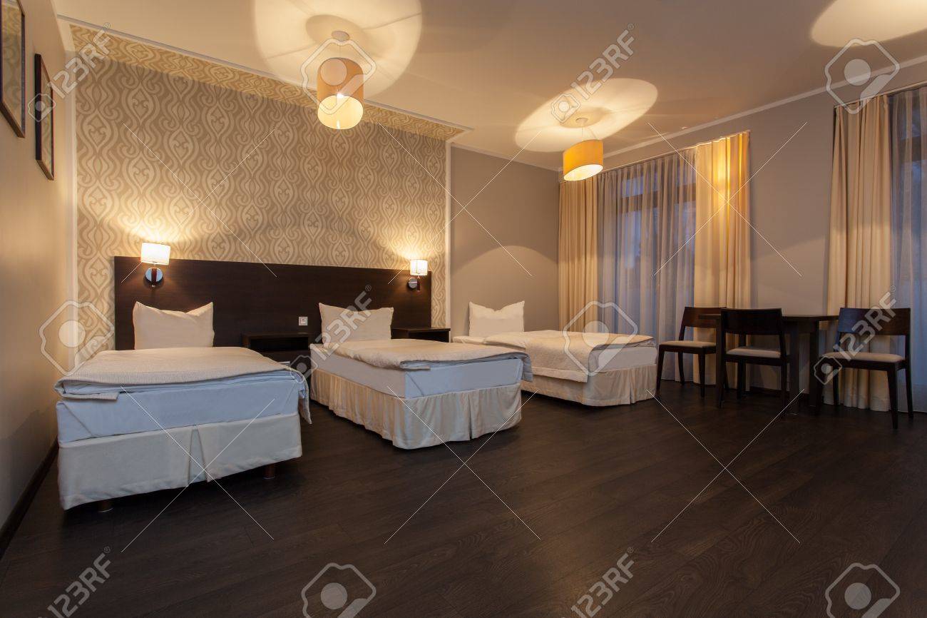 woodland hotel bedroom with three beds luxurious interior stock woodland hotel bedroom with three beds luxurious interior stock