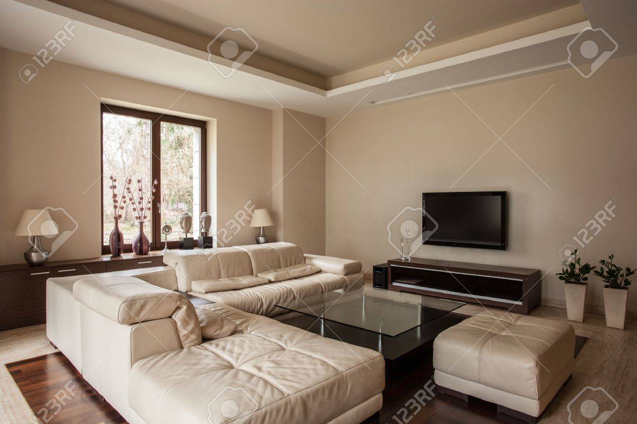 Travertine House Soft And Comfortable Sofa In Living Room Stock