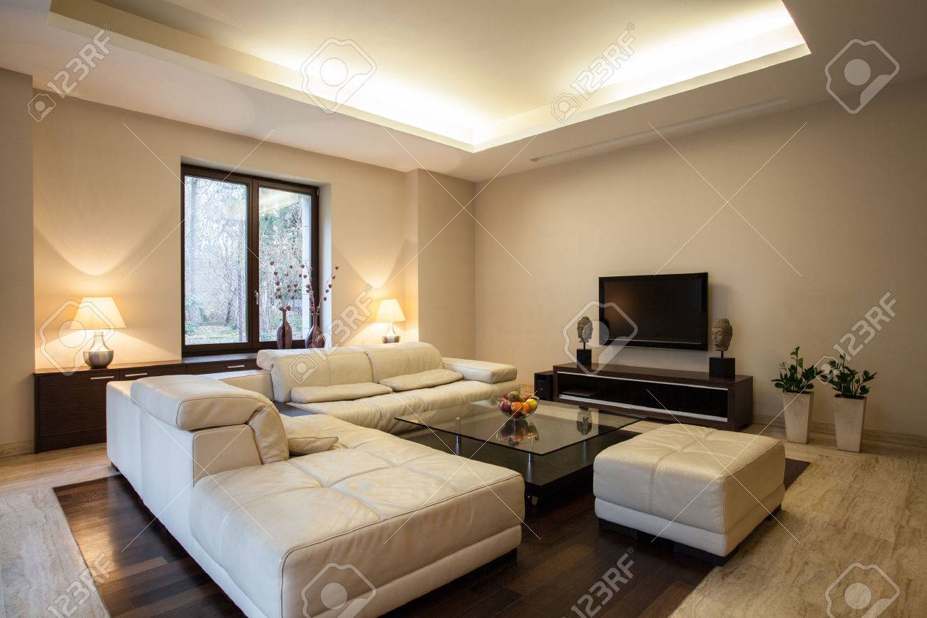 travertine house: horizontal view on arranged living room stock travertine house: horizontal view on arranged living room stock