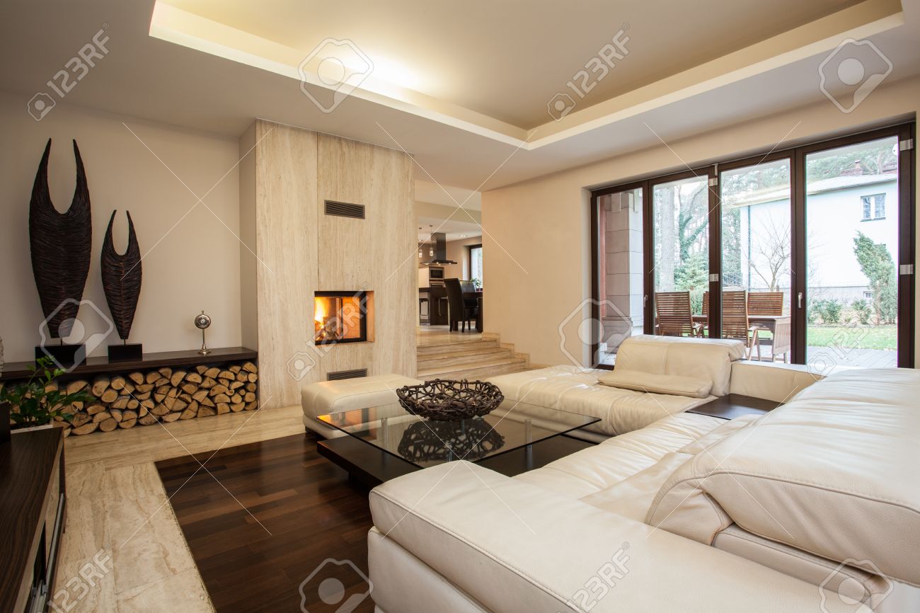 travertine house: contemporary living room with fireplace stock travertine house: contemporary living room with fireplace stock