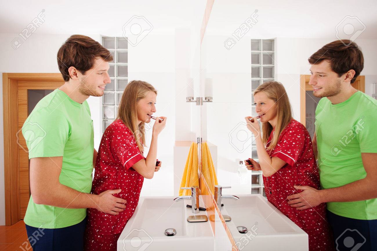 Husband Observing How Wife Applying