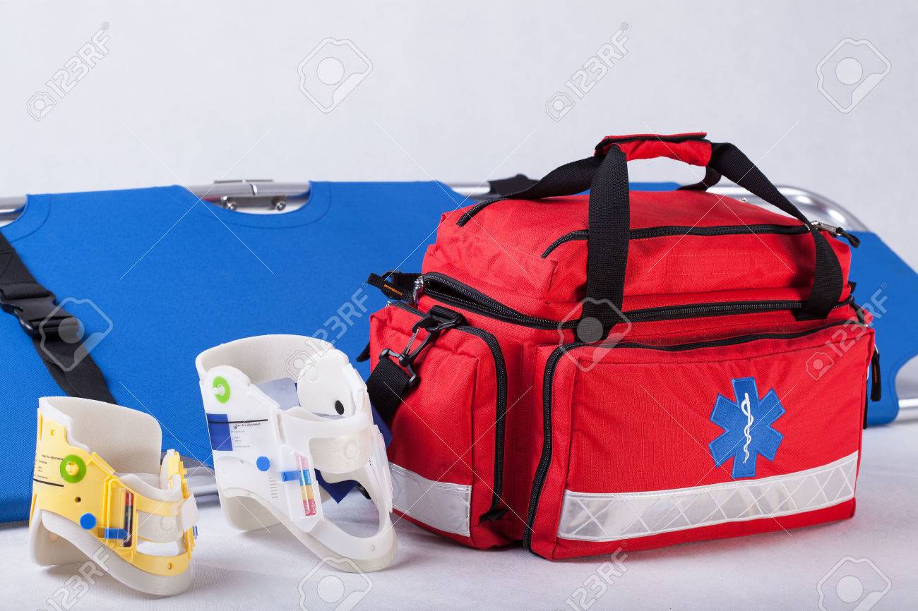 Rescue bag, cervical collars and stretcher on white background - 27667946 Rescue bag, cervical collars and stretcher on white background - 27667946