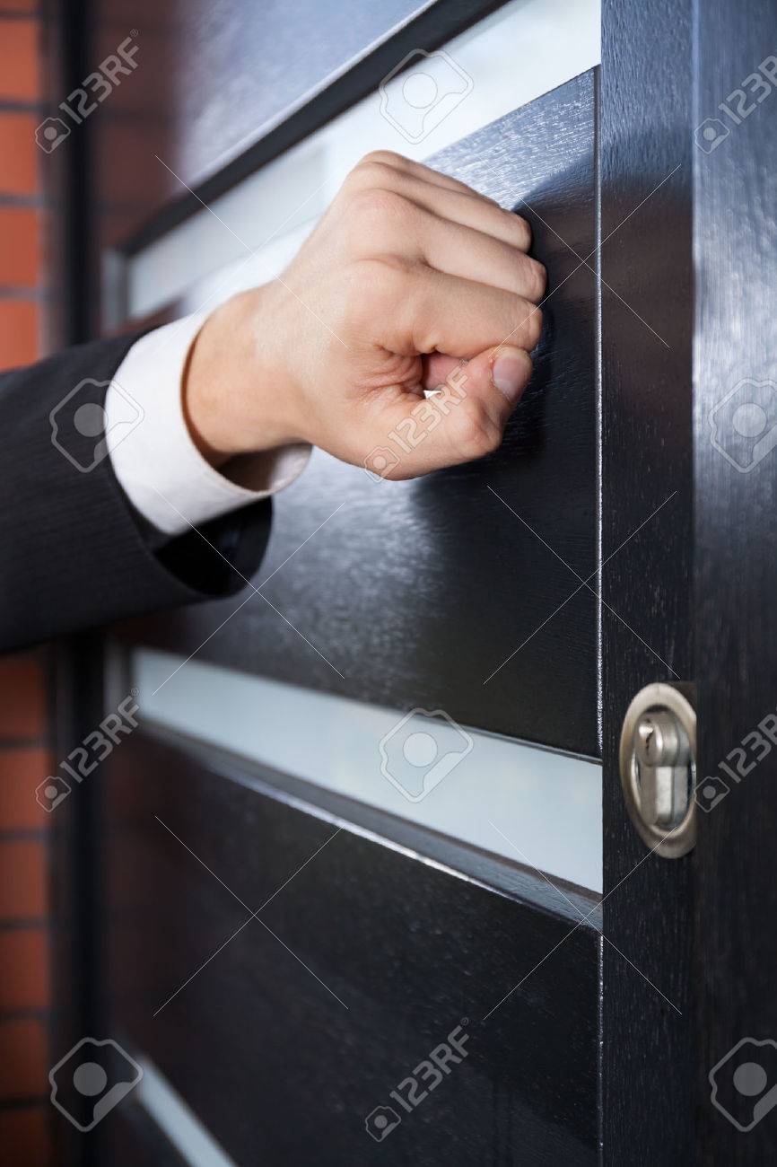 Door to door salesman knocking on the door - 33085230 Door to door salesman knocking on the door - 33085230
