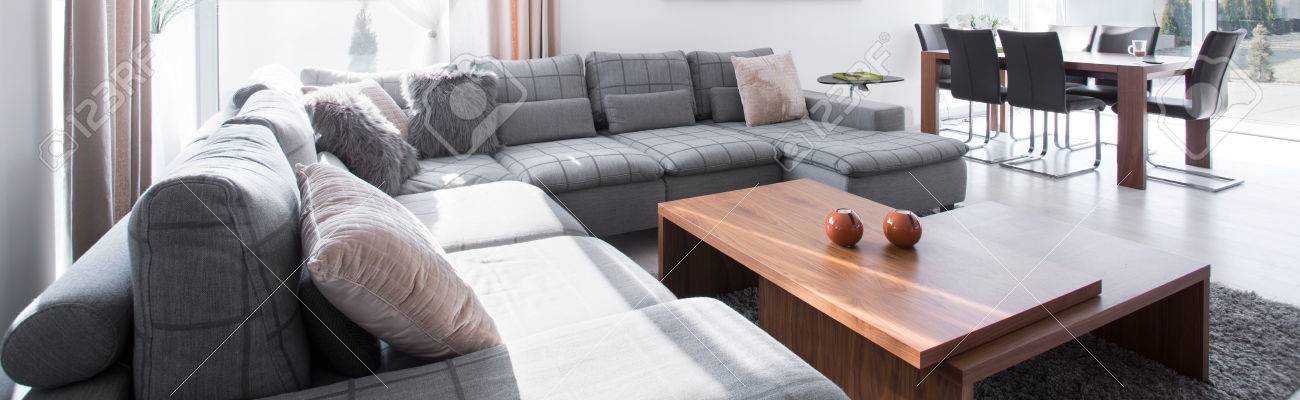 big comfortable couch and stylish wooden coffee table stock photo 4034282632 couch