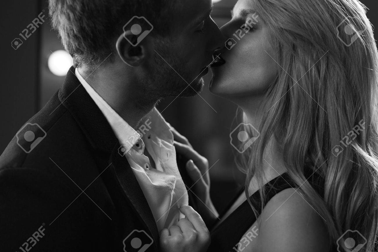 Portrait Of Man And Woman In Love Kissing Passionately Stock Photo Picture And Royalty Free Image Image 41795299