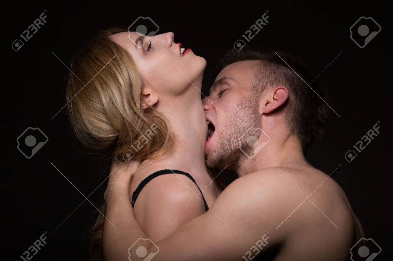 Man Passionately Kissing And Biting A Woman In The Neck Stock Photo Picture And Royalty Free Image Image 44084596