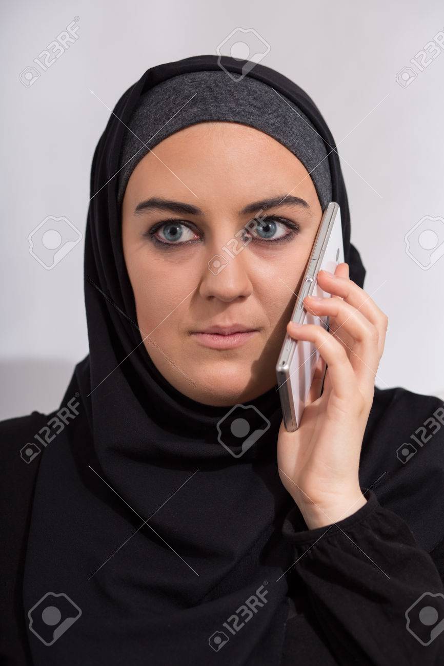Headshot Of Young Arab Girl Talking On The Phone Stock Photo Picture And Royalty Free Image Image 48557540