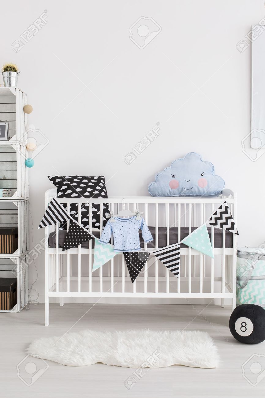 Uncategorized Scandinavian Crib shot of a crib in scandinavian style baby room stock photo 53781401