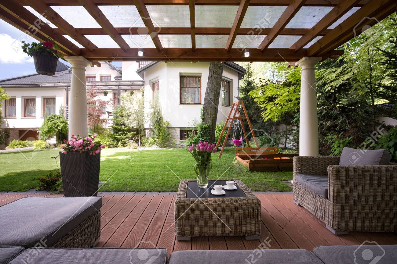 Close-up of gazebo with stylish garden furniture - 53989339 Close-up of gazebo with stylish garden furniture - 53989339