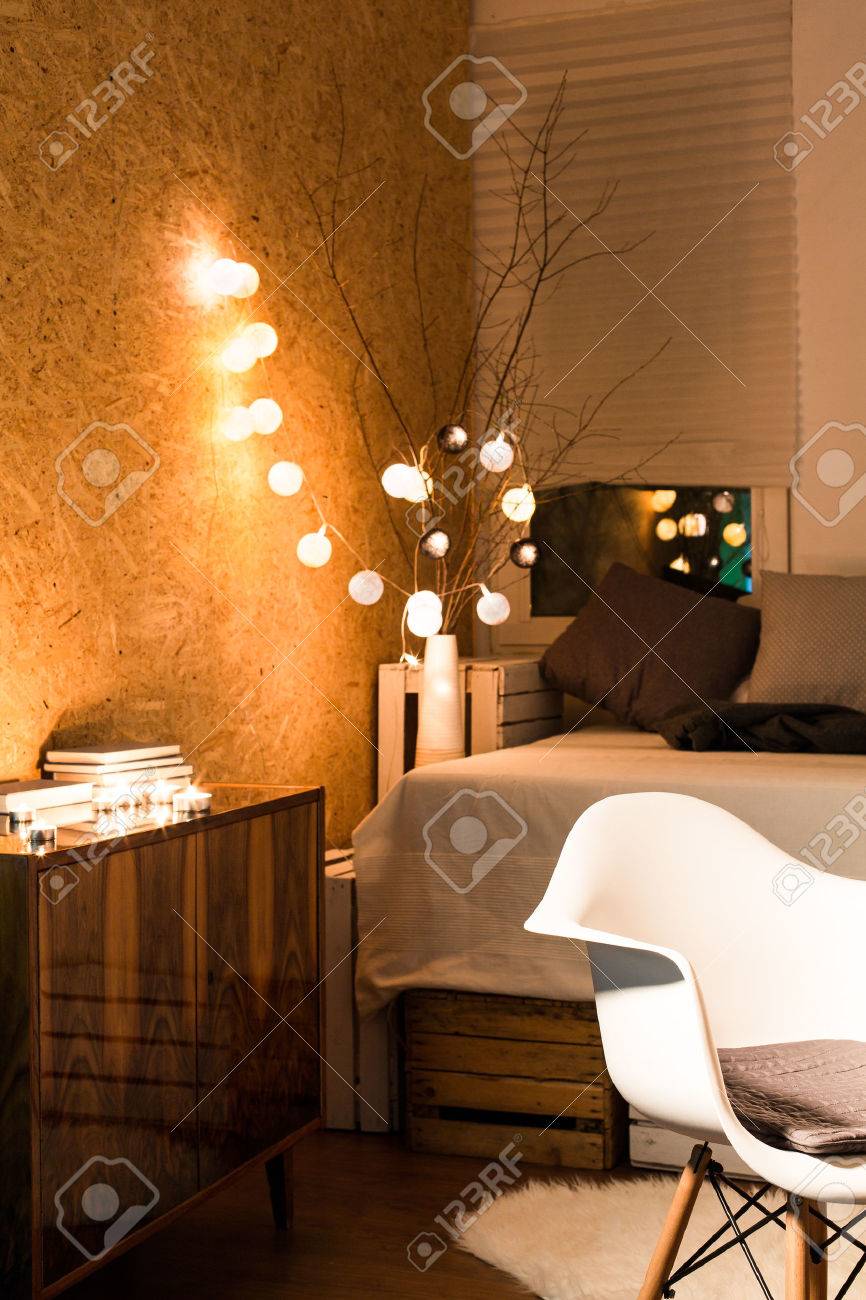 Shot Of A Small Comfortable Cosy Bedroom