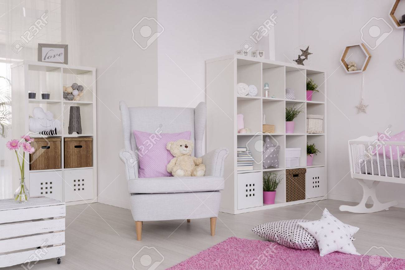 White Wing Chair In A Cute Baby Room Surrounded With Baby Room