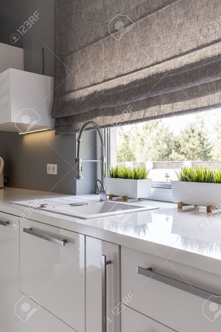 Image Of High Gloss White Modern Kitchen With Window Roller Blinds Stock Photo Picture And Royalty Free Image Image 60709505