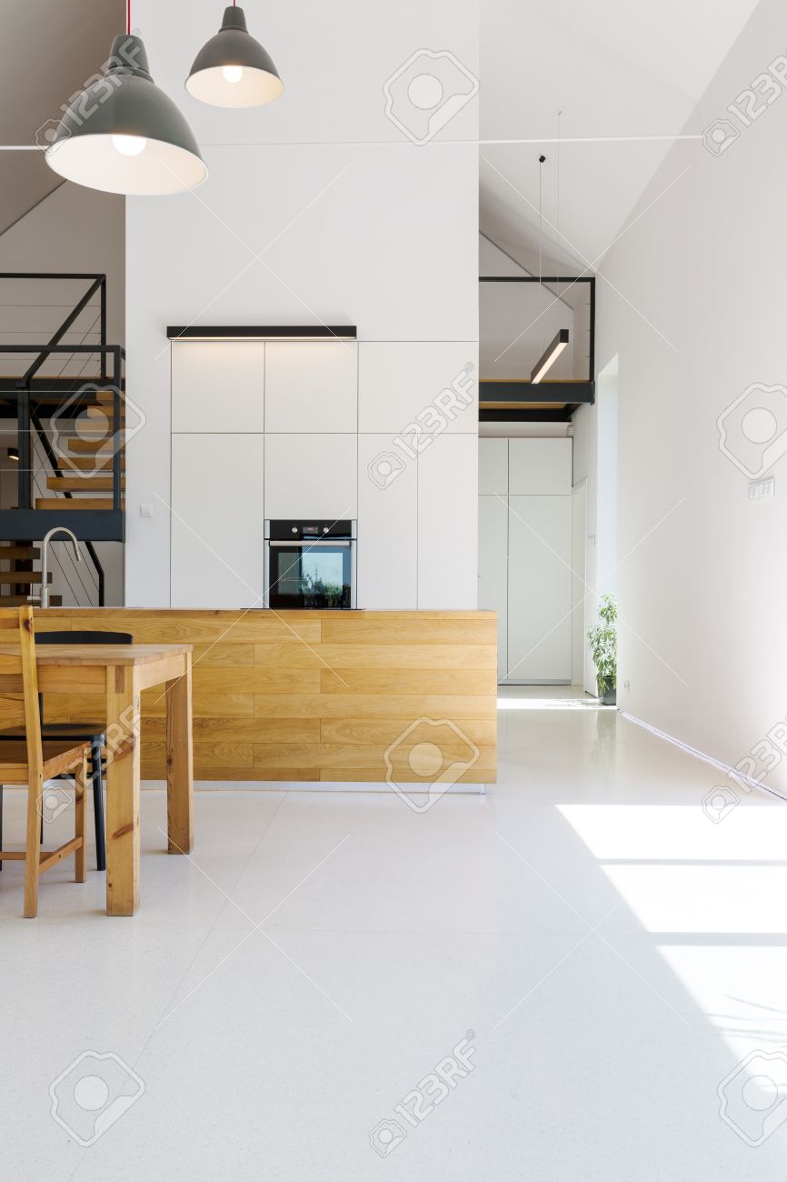 Modern Minimalist Kitchen With Wooden Furnitures White Walls