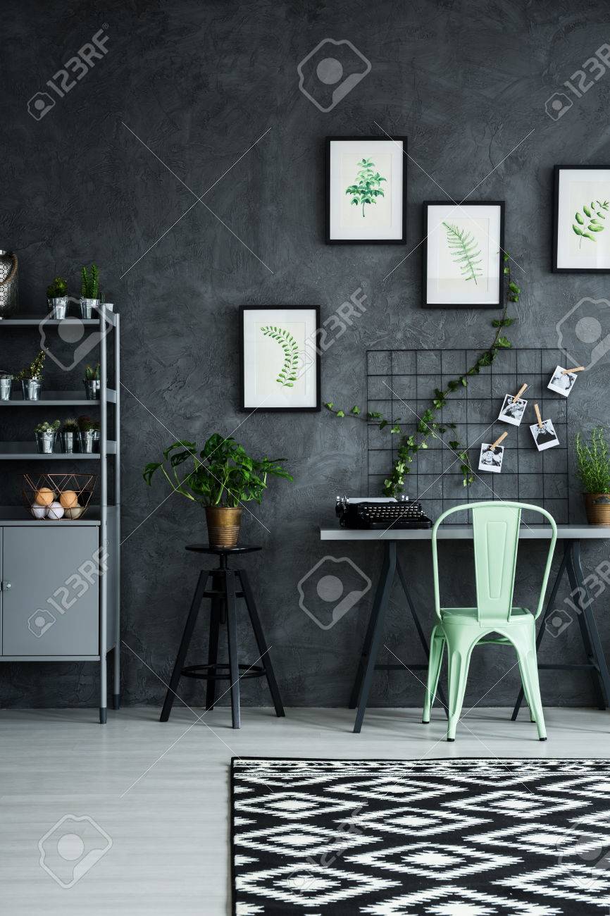 mint chair in modern apartment with cyan wall stock photo 68145324
