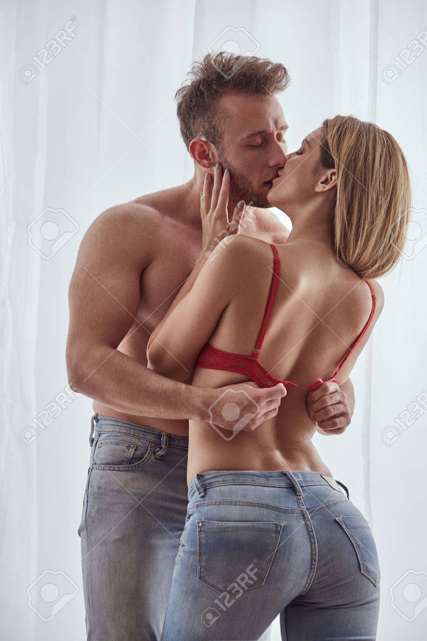 Sexy Lovers Kissing And Undressing Each Other During Foreplay Stock Photo,  Picture and Royalty Free Image. Image 71543499.