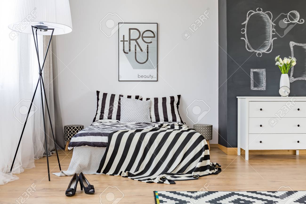 Stylish Woman S Bedroom With Big Bed And Chalkboard Wall
