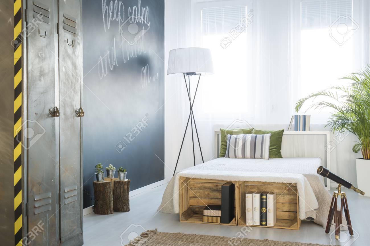 Travel Themed Bedroom Interior With Chalkboard Wall Telescope