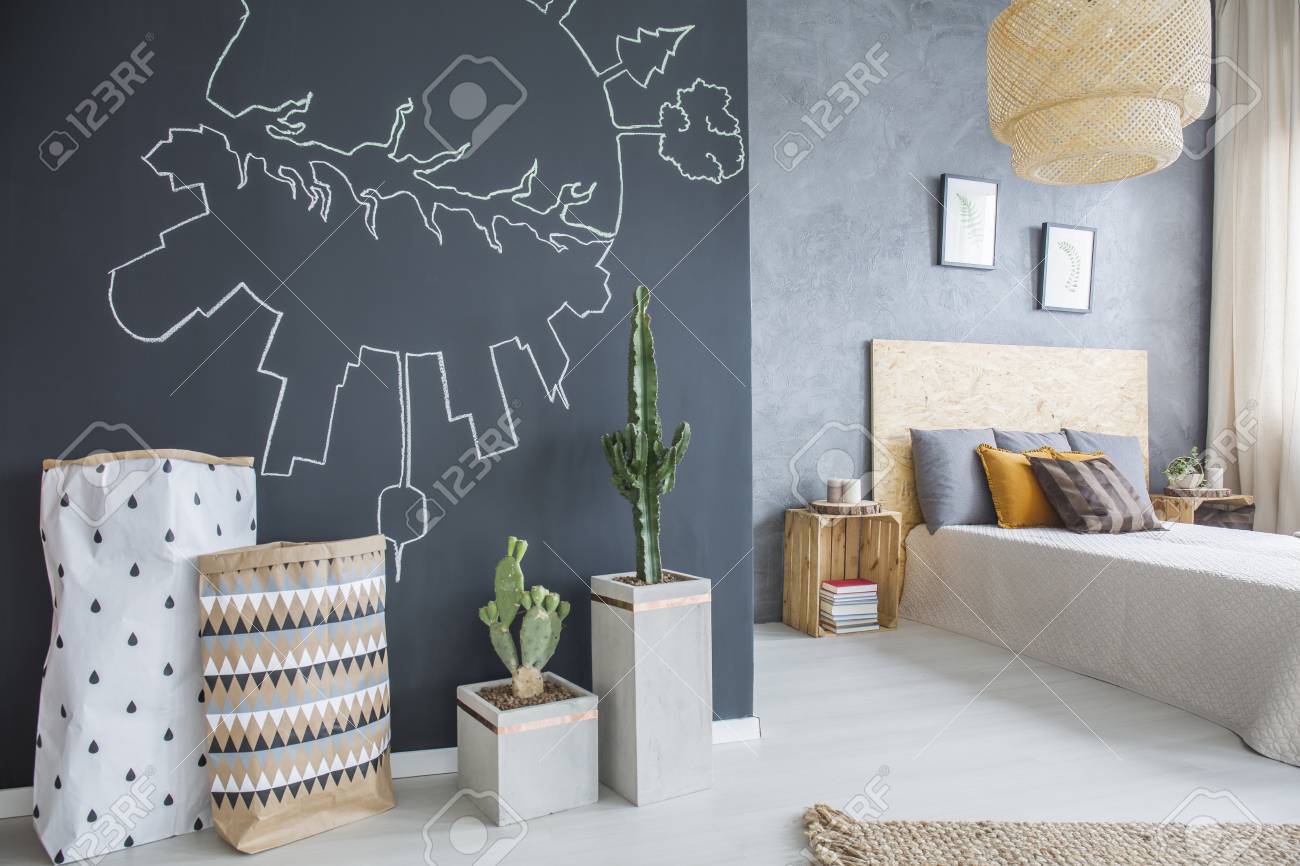 Blackboard With Draw And Cactuses In Modern Bedroom