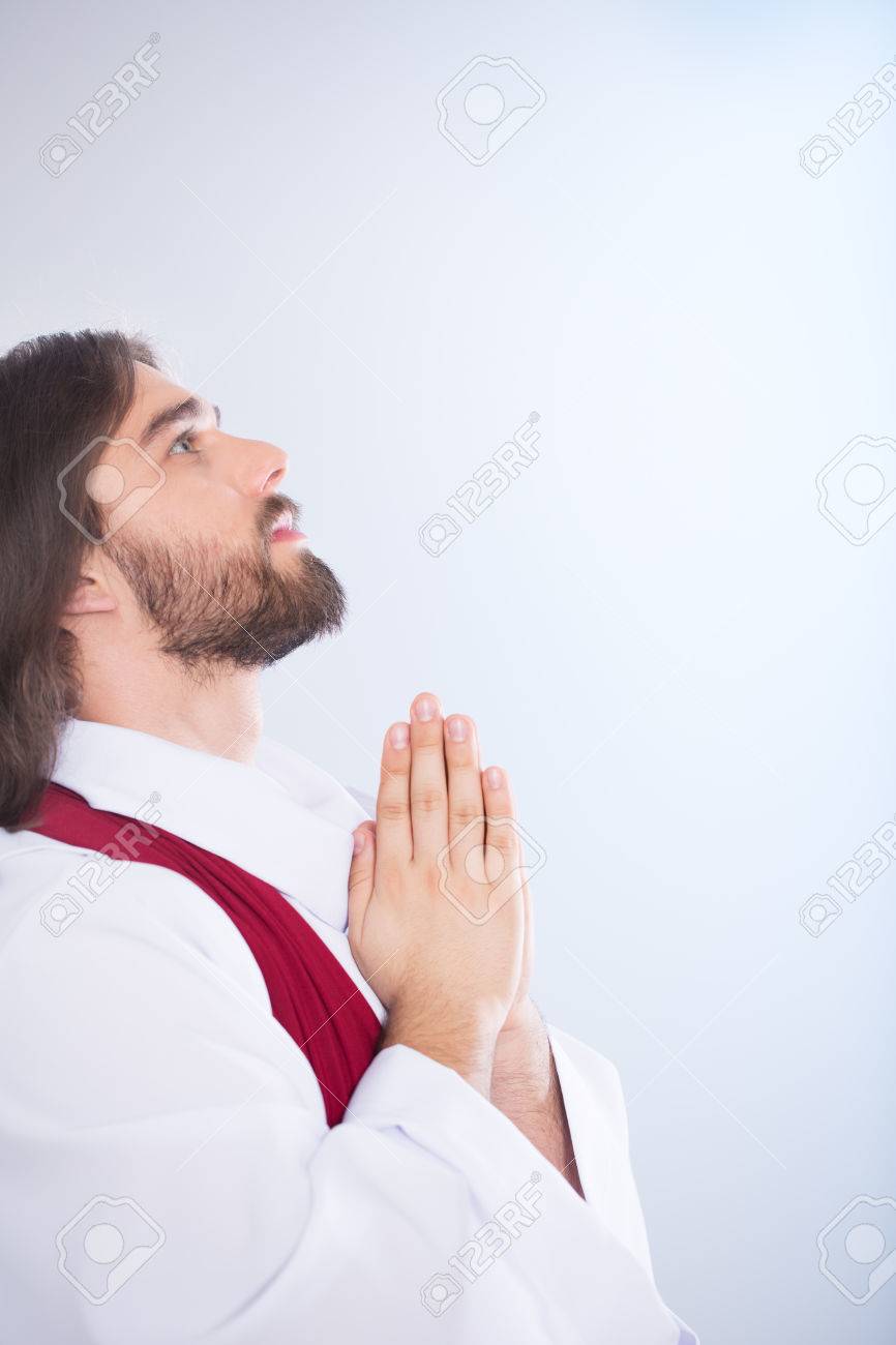 Jesus Christ Looking Up And Praying To Heaven Stock Photo, Picture And  Royalty Free Image. Image 79860901.