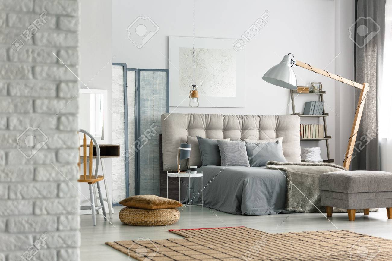 Cozy Grey Bedroom In Modern Loft With White Brick Wall Stock Photo Picture And Royalty Free Image Image 81889353
