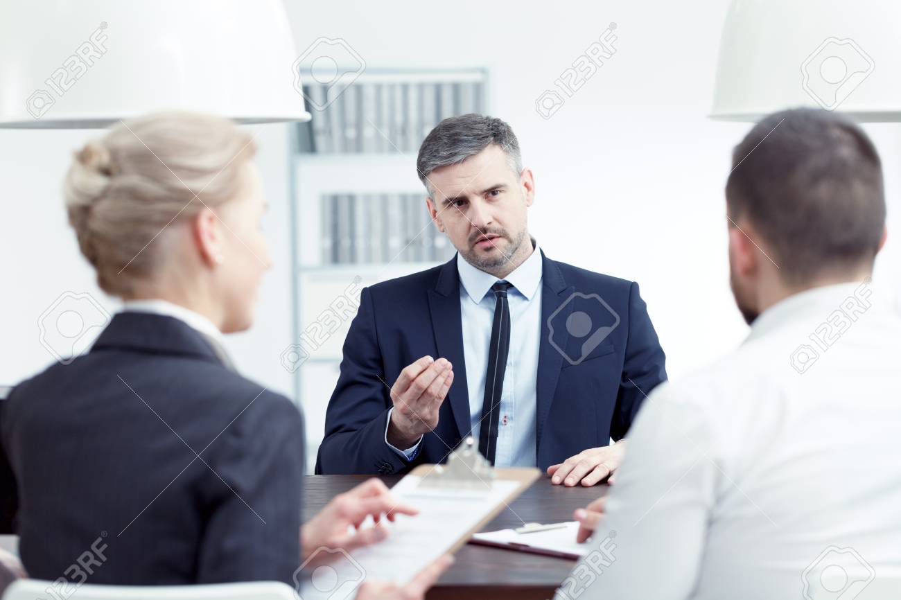 man applying for promotion during interview with board members stock photo 82489945