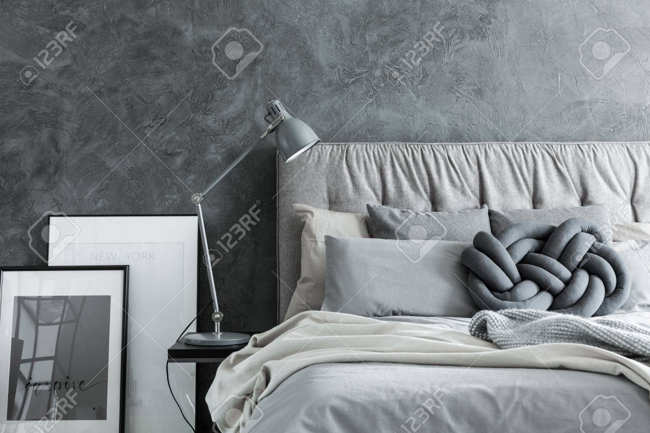 closeup side view of cozy modern bedroom with gray headboard stock photo bed99 modern