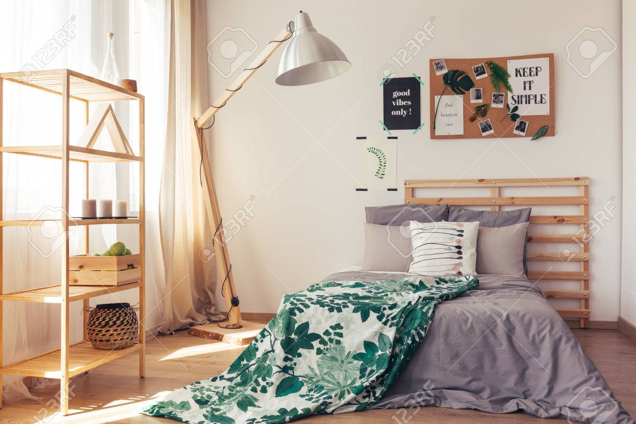Warm Cozy Bedroom With Wooden Furniture White Wall And Soft