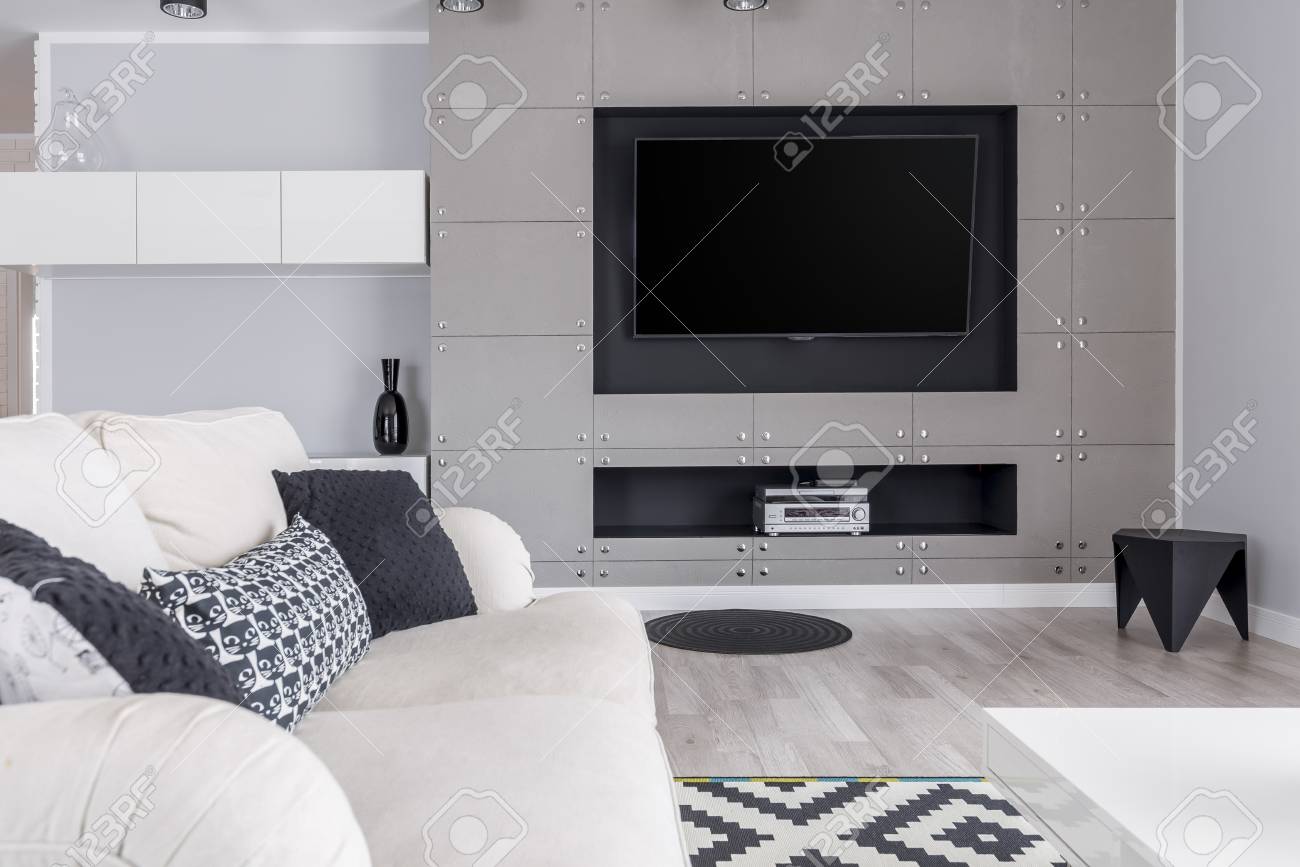 Modern Trendy Gray Living Room With Tv On Wall And Elegant Sofa Stock Photo Picture And Royalty Free Image Image 84519780