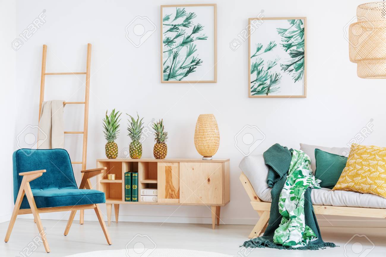 beige sofa with blue pillows