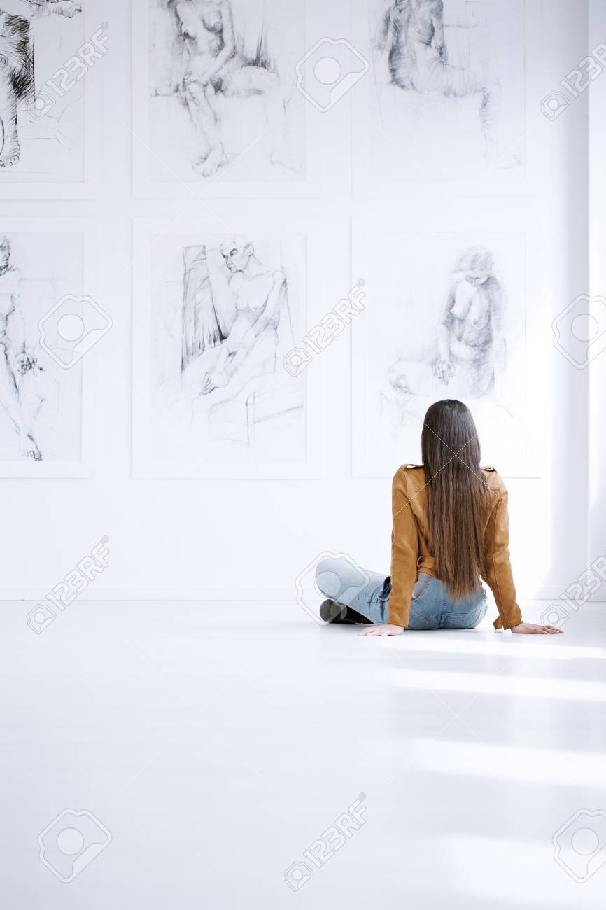 Woman Sitting On Floor And Looking At Drawing Collection On White Wall In Museum Stock Photo Picture And Royalty Free Image Image Woman Sitting On Floor And Looking At Drawing Collection On White Wall In Museum Stock Photo Picture And Royalty Free Image Image