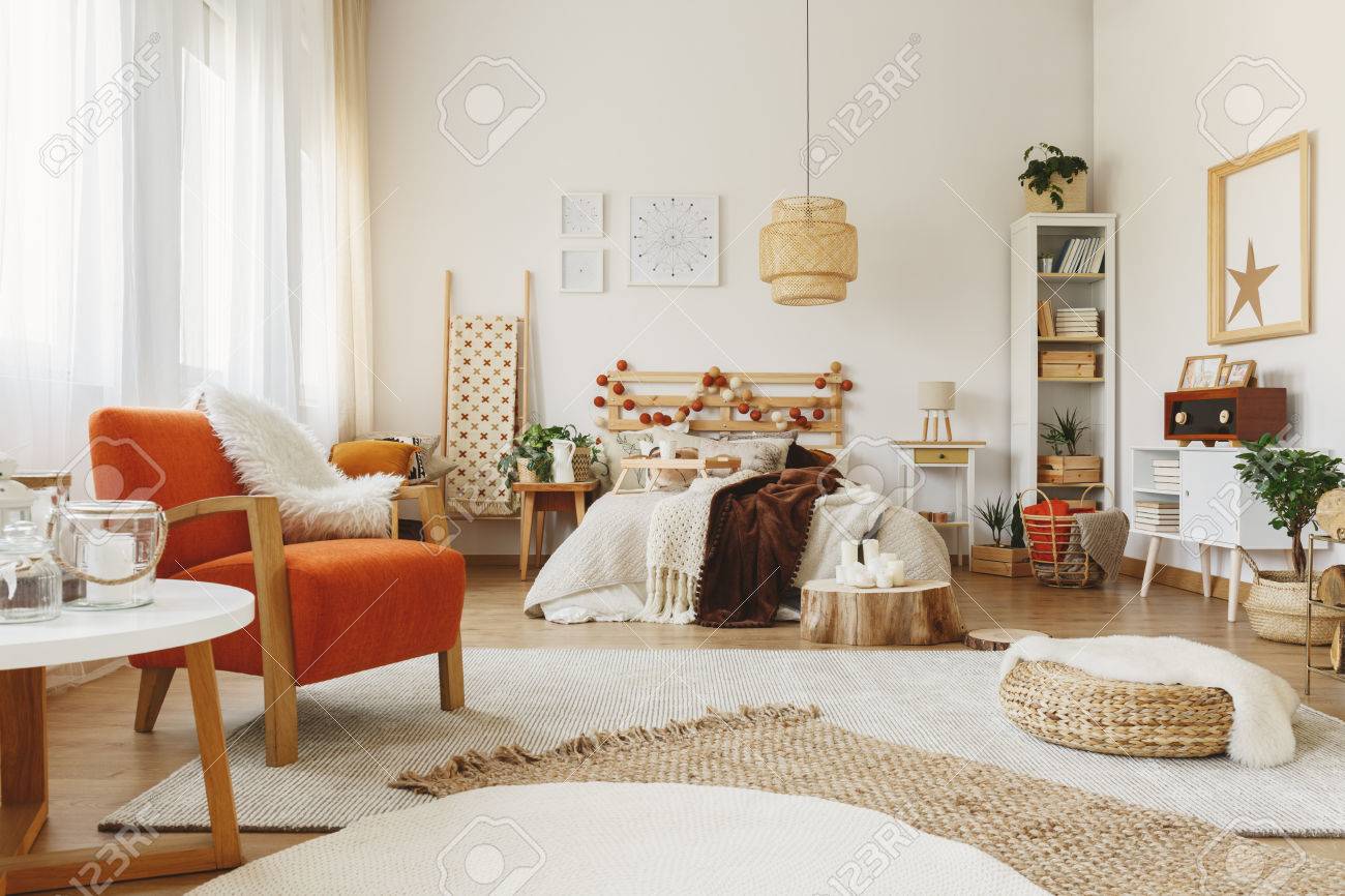 Fully Furnished Scandinavian Bedroom With A Lot Of Rugs Chair