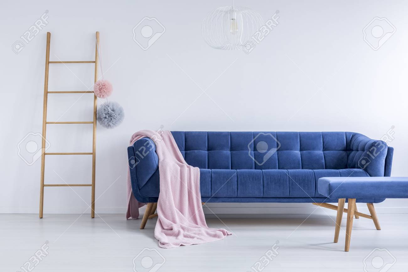 white comfy couch elegant pink coverlet thrown on the blue comfy couch in room with wooden ladder and empty white coverlet thrown on the blue comfy couch in room with wooden white comfy couch elegant pink coverlet thrown on the blue comfy couch in room with wooden ladder and empty white coverlet thrown on the blue comfy couch in room with wooden