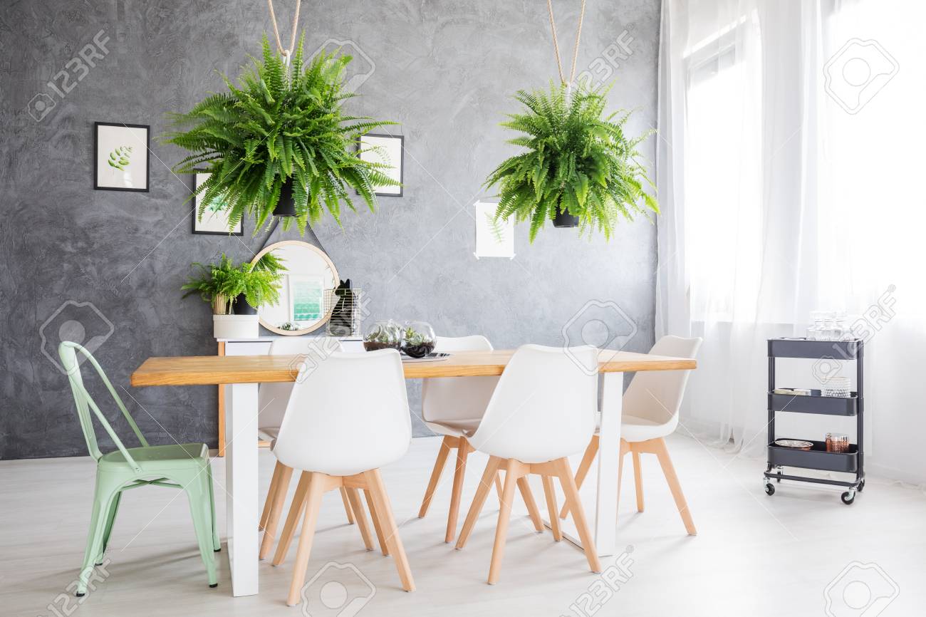 Mirror Reflecting A Green Painting Hanged In A Day Room Furnished Stock Photo Picture And Royalty Free Image Image 92269211