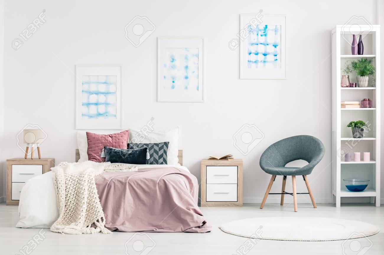 Pink Bedding On The Bed Between Wooden Nightstands In Pastel Stock Photo Picture And Royalty Free Image Image 96666432