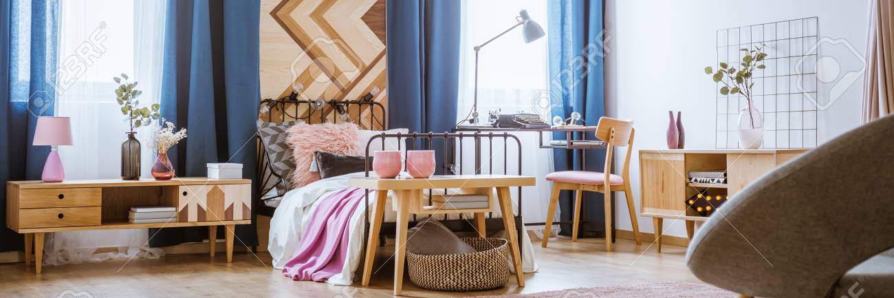 Bedroom Interior For A Teenage Girl With Wooden Furniture